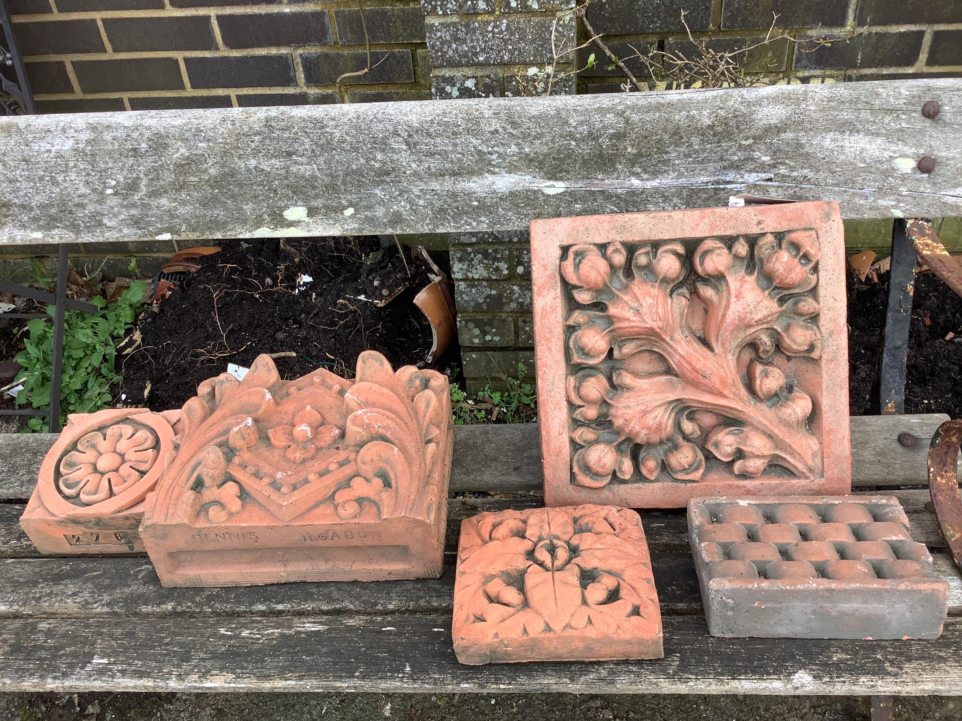 Five terracotta garden tiles, largest 33 x 34cm